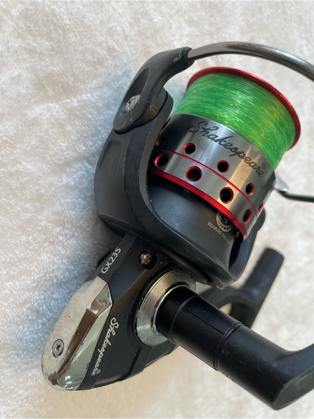 Men’s Shakespeare GX235 Spinning Reel with Bright Green Line
